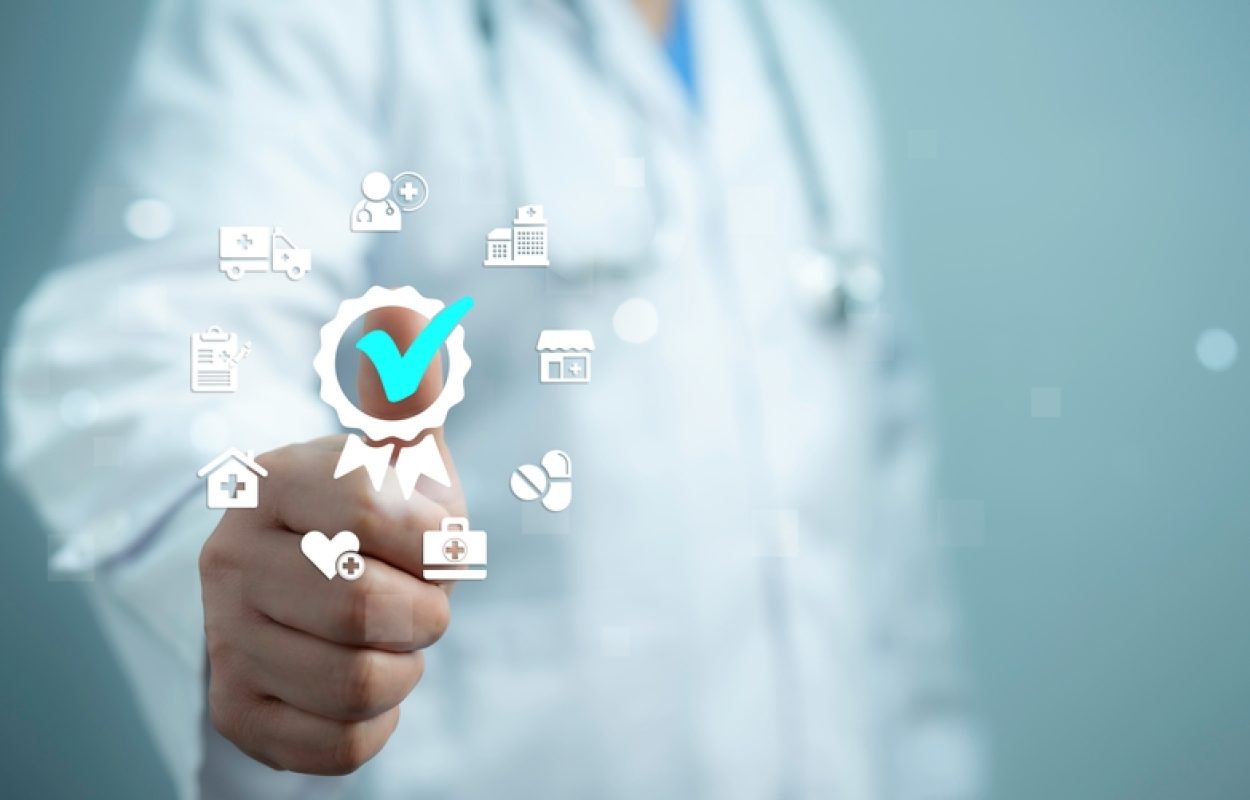 Medical,Worker,Touches,Virtual,Screen,Displaying,Certification,Of,Standard,Quality