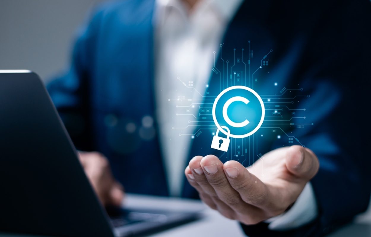 Copyright,Or,Patent,Concept.,Businessman,With,Copyright,Technology,Symbol,On